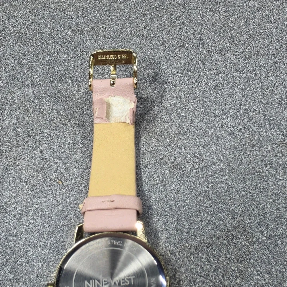 Nine West Watch Womens OS Pink Fair Quilted Strap Gold Tone Crystal Markers
